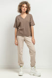 Elegant V-Neck Blouse with Delicate Cuffs and Pleat Detail