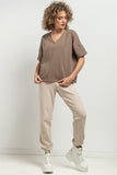 Elegant V-Neck Blouse with Delicate Cuffs and Pleat Detail