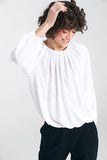 Ecru Lightweight Blouse with Pleated Neckline and Ruffled Hem