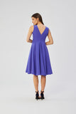 Elegant Sleeveless Dress with Flared Skirt and Pockets