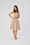 Elegant Sleeveless Polish Dress with Unique Design and Pockets
