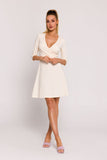 Elegant Flared Knit Mini Dress with Unique Polish Charm