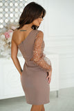 Asymmetrical mini dress with stunning sequin sleeves.