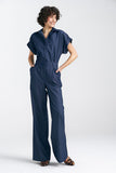 Elegant Waisted Denim Jumpsuit with V-Neckline and Cuffs