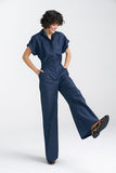Elegant Waisted Denim Jumpsuit with V-Neckline and Cuffs