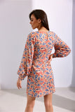 Elegant Mini Dress with Deep Neckline & Flared Hem