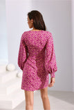 Elegant Mini Dress with Deep Neckline and Flared Hem