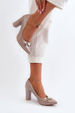 Elegant Stiletto Pumps with Heart Ornament in Natural Leather