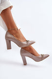 Elegant Stiletto Pumps with Heart Ornament in Natural Leather