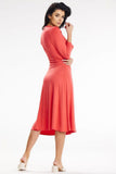 Chic Midi Dress with Fitted Top and Overlapping Skirt