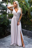 Elegant Beige Brocade Maxi Dress with Deep Neckline & Slit