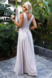 Elegant Beige Brocade Maxi Dress with Deep Neckline & Slit