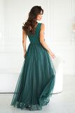 Elegant Long Dress with Unique Cut and Rose Belt