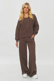Stay stylish and cozy in this trendy hoodie and wide-leg pant set.