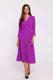 Chic Flared Dress with High Slit and Elegant Button Detail