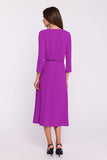 Chic Flared Dress with High Slit and Elegant Button Detail