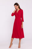 Elegant High-Slit Dress with Flared Hem and Button Details