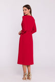 Elegant High-Slit Dress with Flared Hem and Button Details