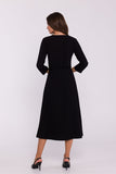 Elegant High-Slit Dress with Flared Hem and Button Detail