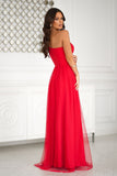 Elegant Sequined Dress with Slit and Mesh Overlay