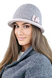 Elegant Pink Pepita Women's Winter Hat with Bow Detail