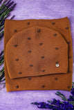 Elegant Winter Polka Dot Hat with Glossy Accent