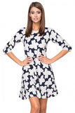 Flared Knit Dress with Delicate Boat Neckline and 3/4 Sleeves