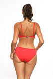 Elegant Two-Piece Swimsuit with Gold Accents and Plunge Neckline