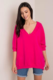 Cozy loose-fit sweatshirt with long sleeves and heart neckline.