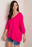 Cozy loose-fit sweatshirt with long sleeves and heart neckline.