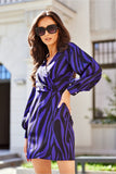 Elegant Mini Dress with Deep Neckline and Buffet Sleeves