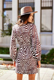 Elegant Mini Dress with Deep Neckline and Long Sleeves