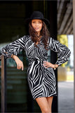 Elegant Mini Dress with Deep Neckline and Flared Hem