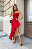Chic Spanish-style dress with ruffled bias hem and fitted top.
