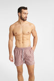 Bright Pink Swim Trunks with Decorative Bird Prints