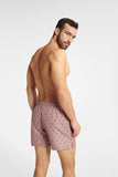 Bright Pink Swim Trunks with Decorative Bird Prints