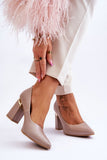 Elegant Pointed Toe Leather Pumps with Unique Heel Detail