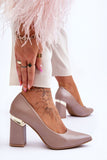 Elegant Pointed Toe Leather Pumps with Unique Heel Detail