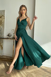 Elegant satin dress with cut-out top and flowing slit skirt.