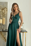 Elegant satin dress with cut-out top and flowing slit skirt.