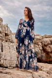 Elegant maxi dress with a flowing cut and chic details.