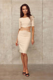 Feminine Knitted Two-Piece Set with Tied Top & Midi Skirt