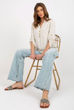 Chic Blouse with Heart Neckline and Decorative Clasp