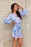 Elegant Mini Dress with Teardrop Neckline & Side Binding