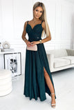 Elegant bottle green brocade maxi dress with leg slit.