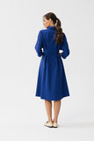 Elegant Collared Dress with Button Closure and Pleats