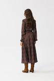 Elegant Geometric Maxi Dress with Ruffle Hem and Tie Belt