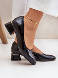 Elegant Natural Leather Pumps with Decorative Heel Detail