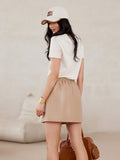 Trendy Leather-Like Trapeze Mini Skirt with Pockets