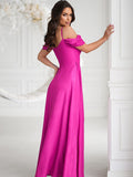 Elegant Fitted Dress with Flowing Skirt and Slit Detail